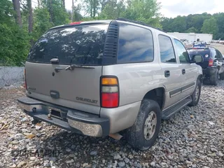 2005 Chevrolet Tahoe LS with VIN 1GNEC13V55R235594, listed as a IAAI auction lot 42245180 with 312,669 mi miles and . Bid and sale history available at DreamBid. Image 4.