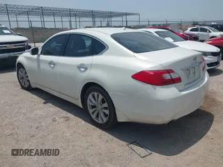 2011 Infiniti M with VIN JN1BY1AP5BM323980, listed as a IAAI auction lot 42293425 with 112,139 mi miles and . Bid and sale history available at DreamBid. Image 3.