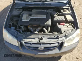 2006 Kia Spectra EX with VIN KNAFE122X65277053, listed as a Copart auction lot 75697314 with 147,156 mi miles and Salvage Title. Bid and sale history available at carsss.com. Image 12.