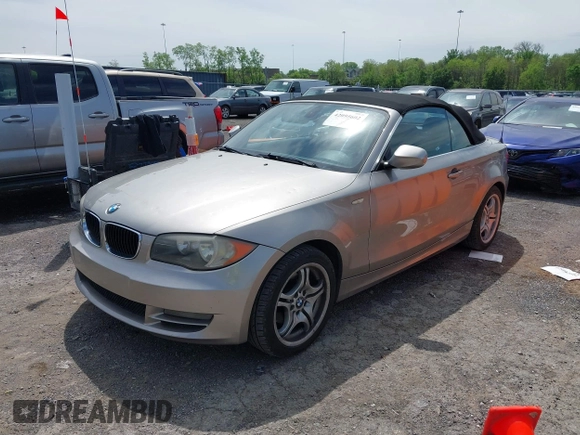 2011 BMW 1 Series 128i with VIN WBAUL7C5XBVE87044, listed as a IAAI auction lot 42095602 with 163,049 mi miles and . Bid and sale history available at carsss.com. Image 2.