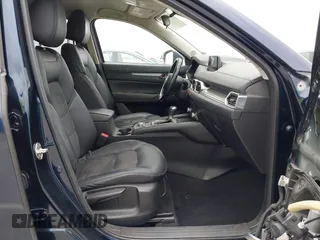 2020 Mazda CX-5 Touring with VIN JM3KFACM2L0856777, listed as a IAAI auction lot 42073972 with 151,628 mi miles. Bid and sale history available at carsss.com. Image 5.