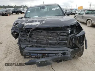 2023 GMC Canyon 4WD Elevation with VIN 1GTP6BEK4P1194765, listed as a Copart auction lot 44415295 with 0 mi miles and Salvage Title. Bid and sale history available at carsss.com. Image 5.