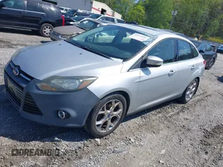 2014 Ford Focus Titanium with VIN 1FADP3J27EL227261, listed as a IAAI auction lot 41972536 with 172,470 mi miles. Bid and sale history available at carsss.com. Image 2.