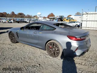 2023 BMW M8 Competition with VIN WBSAE0C09PCM48868, listed as a Copart auction lot 77753414 with 0 mi miles and Salvage Title. Bid and sale history available at carsss.com. Image 2.