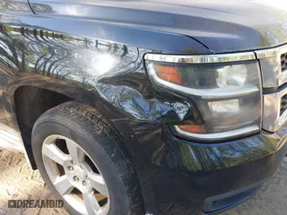 2015 Chevrolet Suburban LT with VIN 1GNSKJKC0FR238524, listed as a IAAI auction lot 42046889 with 179,676 mi miles. Bid and sale history available at carsss.com. Image 6.