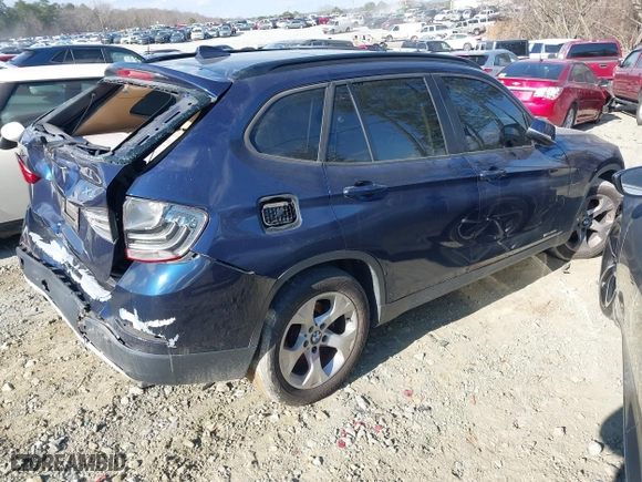 2013 BMW X1 28i with VIN WBAVM1C52DVW46153, listed as a IAAI auction lot 41236419 with 160,732 mi miles. Bid and sale history available at carsss.com. Image 4.