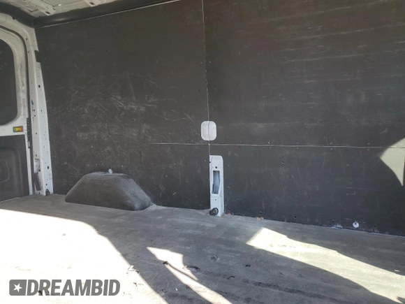2021 Ford Transit Cargo with VIN 1FTBR1C84MKA29405, listed as a Copart auction lot 77642004 with 144,624 mi miles and Salvage Title. Bid and sale history available at DreamBid. Image 11.