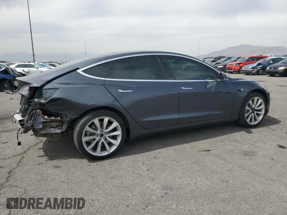 2019 Tesla Model 3 Mid Range z VIN 5YJ3E1EA2KF417212, wystawiony jako Copart lot #50968615 z przebiegiem 104 807 mil mil oraz Szkody całkowita. Historia ofert i sprzedaży dostępna na DreamBid. Obrazek 3.