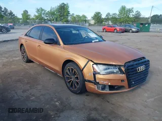 2011 Audi A8 z VIN WAURVAFD3BN013482, wystawiony jako IAAI lot #42109455 z przebiegiem 179 818 mil mil oraz . Historia ofert i sprzedaży dostępna na DreamBid. Obrazek 1.