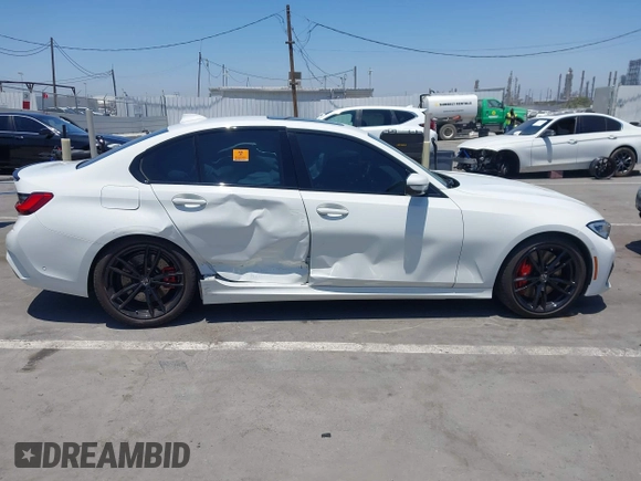 2019 BMW 3 Series 330i with VIN WBA5R1C55KAJ98934, listed as a IAAI auction lot 42396379 with 65,946 mi miles and . Bid and sale history available at DreamBid. Image 13.