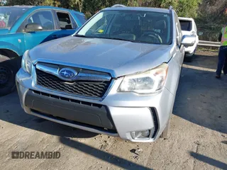 2015 Subaru Forester 2.0XT Touring with VIN JF2SJGWC7FH511989, listed as a IAAI auction lot 41888571 with 135,501 mi miles. Bid and sale history available at carsss.com. Image 12.