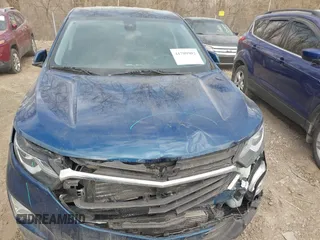 2020 Chevrolet Equinox LT z VIN 2GNAXKEV3L6109751, wystawiony jako IAAI lot #41709902 z przebiegiem 129 468 mil mil oraz . Historia ofert i sprzedaży dostępna na DreamBid. Obrazek 6.