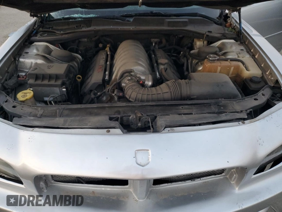 2006 Dodge Charger SRT-8 with VIN 2B3KA73W26H279925, listed as a Copart auction lot 78479574 with 127,443 mi miles and Salvage Title. Bid and sale history available at DreamBid. Image 11.