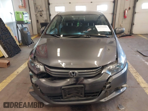 2010 Honda Insight LX with VIN JHMZE2H54AS040316, listed as a IAAI auction lot 41572246 with 142,850 mi miles and . Bid and sale history available at DreamBid. Image 12.