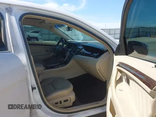2015 Ford Taurus Limited with VIN 1FAHP2F8XFG175319, listed as a IAAI auction lot 42079604 with 1 mi miles. Bid and sale history available at carsss.com. Image 5.