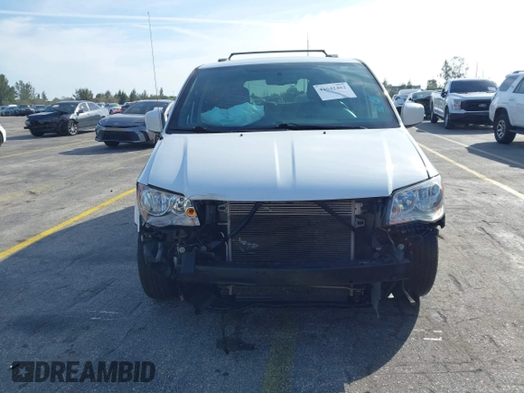 2018 Dodge Grand Caravan SXT with VIN 2C4RDGCG5JR179043, listed as a IAAI auction lot 41642462 with 117,264 mi miles and . Bid and sale history available at DreamBid. Image 6.
