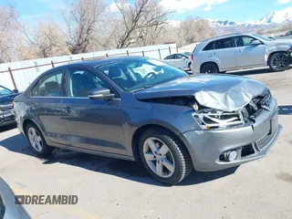 2012 Volkswagen Jetta TDI w/Premium & Nav z VIN 3VWLL7AJ5CM361646, wystawiony jako IAAI lot #41856672 z przebiegiem 190 292 mil mil oraz . Historia ofert i sprzedaży dostępna na DreamBid. Obrazek 13.