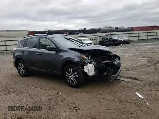 2018 Toyota RAV4 LE with VIN JTMBFREV1JD248395, listed as a Copart auction lot 51752305 with 62,161 mi miles and Salvage Title. Bid and sale history available at DreamBid. Image 12.