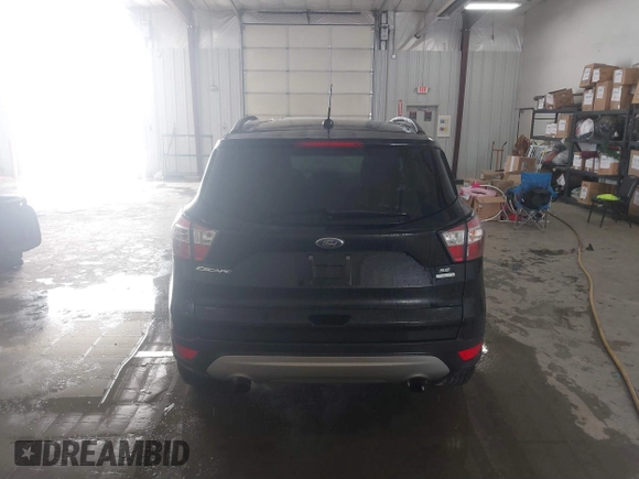 2018 Ford Escape SE with VIN 1FMCU0G99JUC89312, listed as a IAAI auction lot 41484138 with 149,739 mi miles. Bid and sale history available at carsss.com. Image 16.