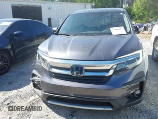 2020 Honda Pilot EX-L с VIN 5FNYF5H58LB006357, выставлен на аукционе IAAI как лот 42191456 с пробегом 87 887 миль миль и . История ставок и продаж доступна на DreamBid. Изображение 12.