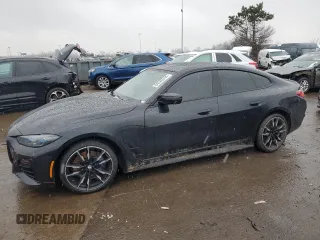 2022 BMW 4 Series M440i xDrive z VIN WBA13AW04NFM09760, wystawiony jako Copart lot #84246244 z przebiegiem 63 877 mil mil oraz Szkoda całkowita • Salvage title. Historia ofert i sprzedaży dostępna na DreamBid. Obrazek 1.