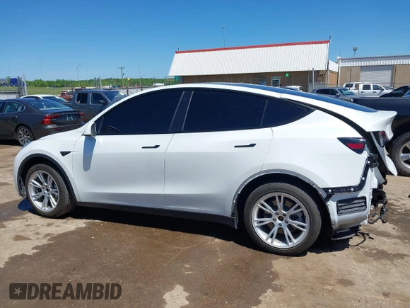 2020 Tesla Model Y Long Range z VIN 5YJYGDEE0LF035248, wystawiony jako IAAI lot #42162191 z przebiegiem 115 533 mil mil oraz . Historia ofert i sprzedaży dostępna na DreamBid. Obrazek 15.