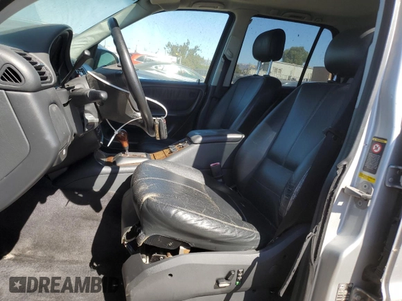 2000 Mercedes-Benz M 320/430/500 with VIN 4JGAB72E5YA173269, listed as a Copart auction lot 71520714 with 239,248 mi miles and Clean title. Bid and sale history available at DreamBid. Image 7.