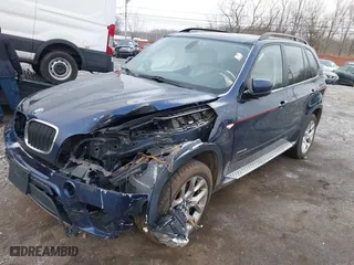 2011 BMW X5 35i with VIN 5UXZV4C54BL738262, listed as a IAAI auction lot 41633474 with 173,914 mi miles. Bid and sale history available at carsss.com. Image 21.