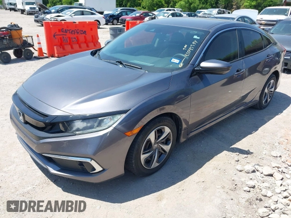 2019 Honda Civic Sedan LX with VIN 19XFC2F63KE025722, listed as a IAAI auction lot 42045594 with 57,290 mi miles. Bid and sale history available at carsss.com. Image 17.