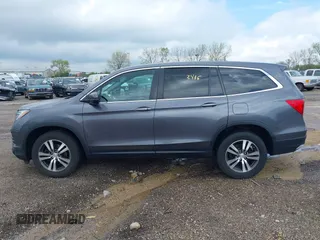 2016 Honda Pilot EX-L with VIN 5FNYF6H51GB097337, listed as a IAAI auction lot 42173415 with 145,415 mi miles. Bid and sale history available at carsss.com. Image 14.