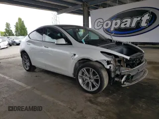 2022 Tesla Model Y Long Range z VIN 7SAYGDEE4NF576275, wystawiony jako Copart lot #53968925 z przebiegiem 30 524 mil mil oraz Szkoda całkowita • Salvage title. Historia ofert i sprzedaży dostępna na DreamBid. Obrazek 4.