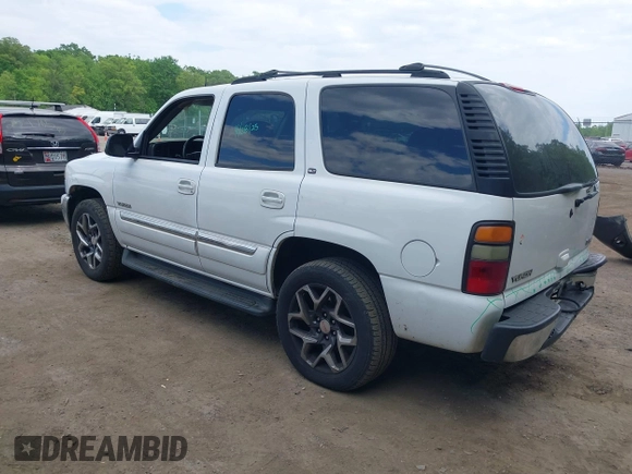 2005 GMC Yukon SLT z VIN 1GKEC13T75R114660, wystawiony jako IAAI lot #42223845 z przebiegiem 199 064 mil mil oraz . Historia ofert i sprzedaży dostępna na DreamBid. Obrazek 3.