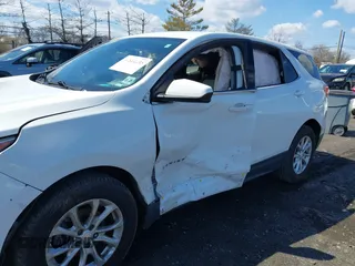 2020 Chevrolet Equinox LT z VIN 2GNAXKEV8L6141918, wystawiony jako IAAI lot #41882535 z przebiegiem 125 974 mil mil oraz . Historia ofert i sprzedaży dostępna na DreamBid. Obrazek 6.