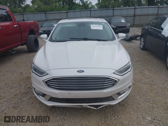 2017 Ford Fusion Titanium with VIN 3FA6P0D96HR239830, listed as a IAAI auction lot 42741998 with 116,951 mi miles and . Bid and sale history available at DreamBid. Image 13.