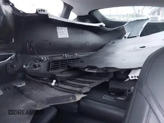 2023 Tesla Model Y Long Range z VIN 7SAYGDEE5PA063097, wystawiony jako IAAI lot #42171871 z przebiegiem Nie podano mil oraz . Historia ofert i sprzedaży dostępna na DreamBid. Obrazek 8.
