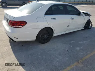 2014 Mercedes-Benz E 350 Sport with VIN WDDHF5KB5EA967675, listed as a Copart auction lot 52763995 with 68,902 mi miles and Salvage title. Bid and sale history available at DreamBid. Image 3.