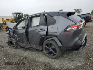 2019 Toyota RAV4 Hybrid XSE with VIN JTMEWRFV3KD517901, listed as a Copart auction lot 57329545 with Not provided miles and Salvage title. Bid and sale history available at DreamBid. Image 2.