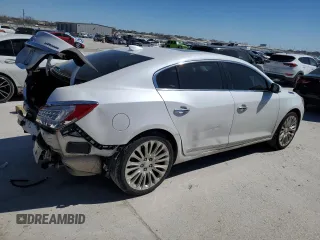 2015 Buick LaCrosse Premium II with VIN 1G4GF5G36FF143868, listed as a Copart auction lot 45902995 with 118,976 mi miles and Salvage Title. Bid and sale history available at DreamBid. Image 4.