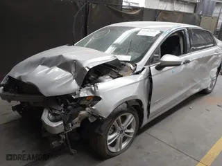 2018 Ford Fusion Hybrid SE with VIN 3FA6P0LUXJR170152, listed as a IAAI auction lot 41467621 with 150,048 mi miles. Bid and sale history available at carsss.com. Image 17.