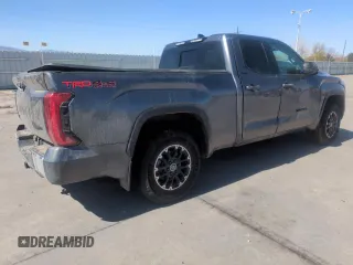 2023 Toyota Tundra SR5 with VIN 5TFLA5DA2PX119857, listed as a Copart auction lot 51942595 with Not provided miles and Salvage title. Bid and sale history available at DreamBid. Image 3.
