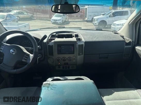 2004 Nissan Titan LE with VIN 1N6AA07A84N590583, listed as a Copart auction lot 49112705 with 92,426 mi miles and Salvage Title. Bid and sale history available at DreamBid. Image 9.