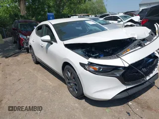 2023 Mazda 3 S Select with VIN JM1BPAKM5P1609227, listed as a IAAI auction lot 42403138 with Not provided miles and . Bid and sale history available at DreamBid. Image 1.