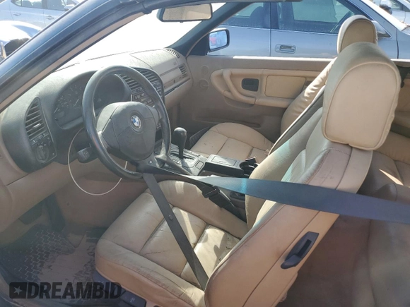 1999 BMW 3 Series 323icA with VIN WBABJ8332XEM23389, listed as a Copart auction lot 76185804 with 0 mi miles and Salvage Title. Bid and sale history available at carsss.com. Image 7.