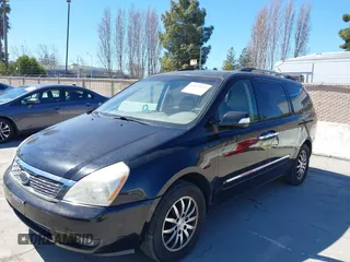 2012 Kia Sedona EX with VIN KNDMH4C75C6425709, listed as a IAAI auction lot 41879455 with 201,086 mi miles. Bid and sale history available at carsss.com. Image 6.
