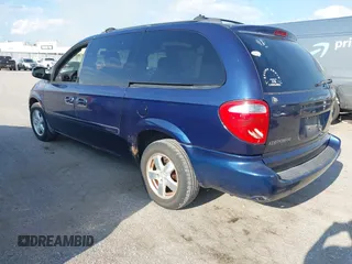 2005 Dodge Caravan SXT with VIN 2D4GP44L65R565519, listed as a IAAI auction lot 42730269 with 124,848 mi miles and . Bid and sale history available at DreamBid. Image 3.