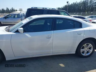 2022 Dodge Charger SXT with VIN 2C3CDXBG4NH197301, listed as a IAAI auction lot 42053688 with 60,592 mi miles and . Bid and sale history available at DreamBid. Image 14.