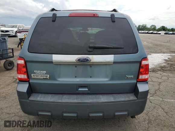 2010 Ford Escape Limited with VIN 1FMCU9EG1AKC28781, listed as a Copart auction lot 61601725 with 99,969 mi miles and Salvage title. Bid and sale history available at DreamBid. Image 6.