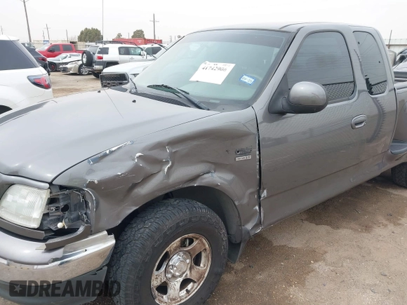2003 Ford F-150 XL with VIN 1FTRX07W33KB50920, listed as a IAAI auction lot 41742906 with 100,560 mi miles and . Bid and sale history available at DreamBid. Image 6.