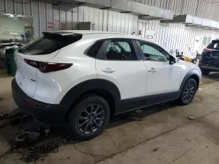 2021 Mazda CX-30 S with VIN 3MVDMBAL8MM214214, listed as a Copart auction lot 58583995 with 98,877 mi miles and Salvage title. Bid and sale history available at DreamBid. Image 3.