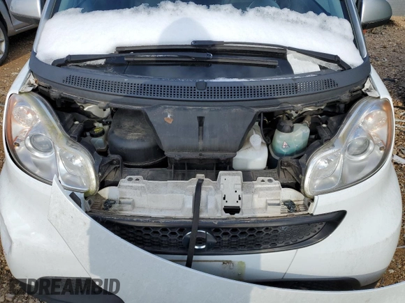 2015 Smart fortwo Passion z VIN WMEEJ3BA8FK790317, wystawiony jako Copart lot #71124392 z przebiegiem Nie podano mil oraz Szkody całkowita. Historia ofert i sprzedaży dostępna na DreamBid. Obrazek 11.